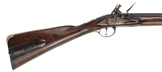 Southern Longrifle,
.50 caliber coned muzzle, 42" swamped barrel,
flintlock, curly maple, engraved brass trim,
used, by Robert Harn